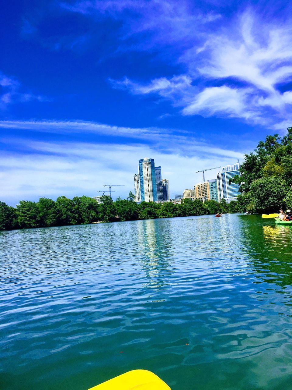 VIEW OF CITYSCAPE AGAINST SKY