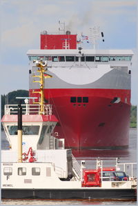 Red ship moored at harbor
