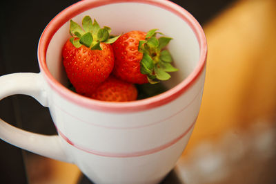 Close-up of fruits in bowl on table