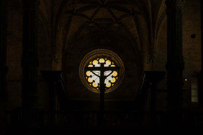 Low angle view of illuminated clock