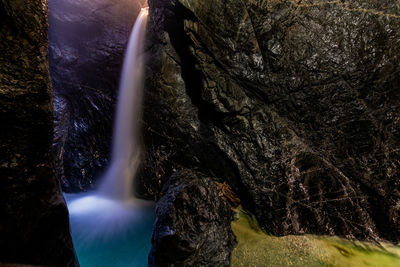 Scenic view of waterfall in forest