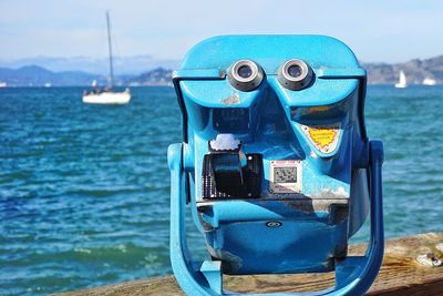 Coin-operated binoculars against sea