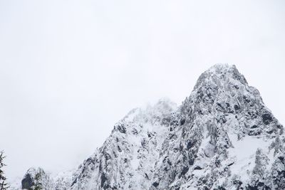 Low angle view of snowcapped mountain