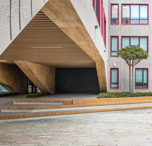 Exterior of building with arca and wood elements