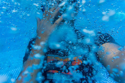 Close-up of man in swimming pool