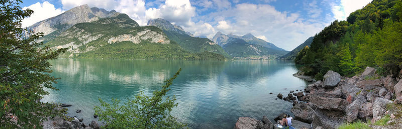 Panoramic view of lake and mountains against sky