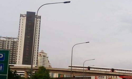 Low angle view of skyscraper against sky