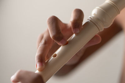 Cropped hand of person with nail polish