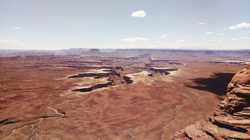 Aerial view of desert against sky