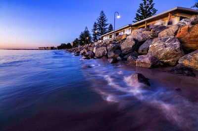 Scenic view of sea against blue sky