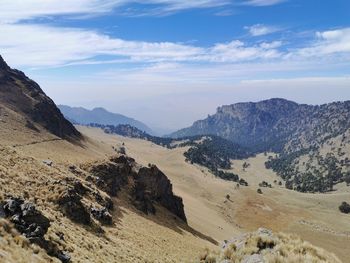 Scenic view of rocky mountains against sky