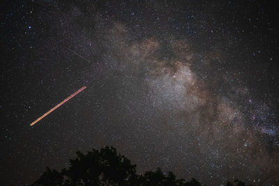 Low angle view of star field against sky at night