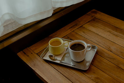 High angle view of coffee cup on table