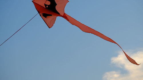 Low angle view of kite against clear sky