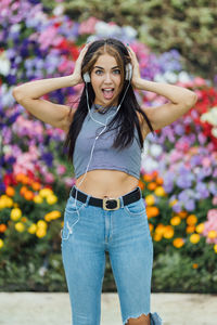 Portrait of a smiling young woman outdoors