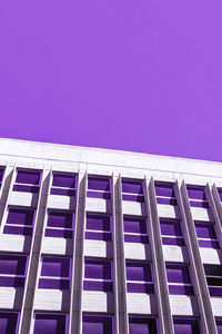 Low angle view of building against clear blue sky