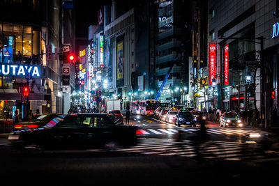 Traffic on city street at night