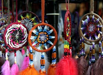 Clothes hanging in market for sale
