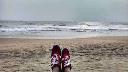 Scenic view of beach against sky