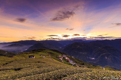 Scenic view of landscape against dramatic sky