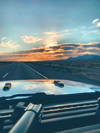 Aerial view of sky seen through car windshield