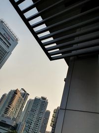 Low angle view of modern buildings against clear sky