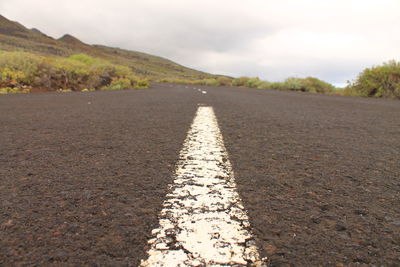 Surface level of road against sky