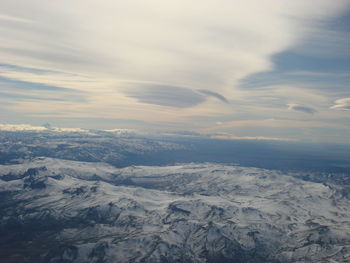 Aerial view of snow covered landscape