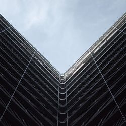 Low angle view of modern building against sky