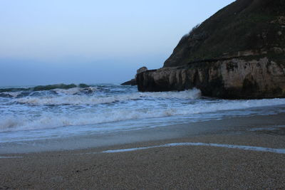 Scenic view of beach against sky