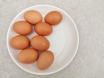 High angle view of eggs in bowl on table