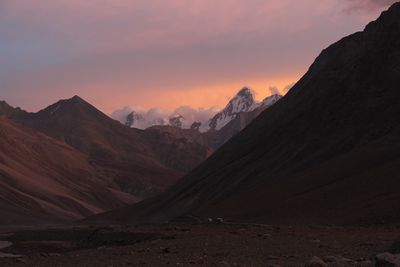 Snow-capped himalayas mountains at sunset