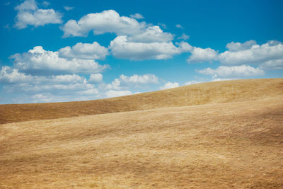 Scenic view of desert against sky