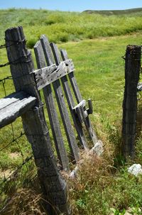 Wooden fence on field