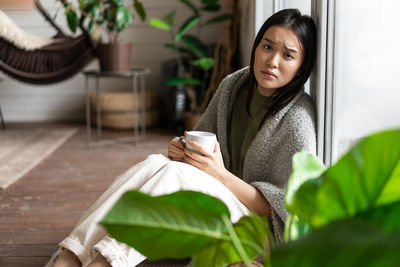 Young woman using mobile phone