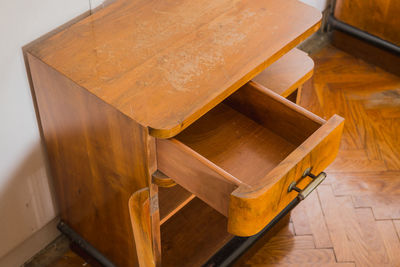 High angle view of chair on table at home