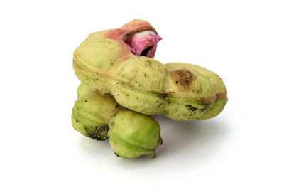 Close-up of fruits against white background