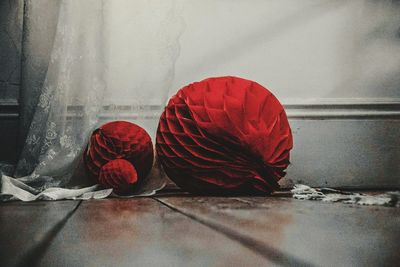 Red umbrella on fabric