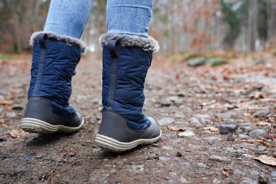 Rear view of traveler in hiking boots