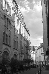 Street in city against sky