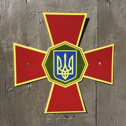 Armed forces of ukraine symbol on wall during sunny day