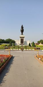 Statue of historic building against sky