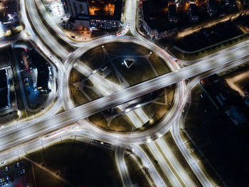 High angle view of illuminated road at night