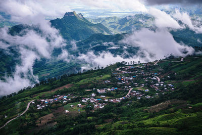 High angle view of trees and buildings against sky