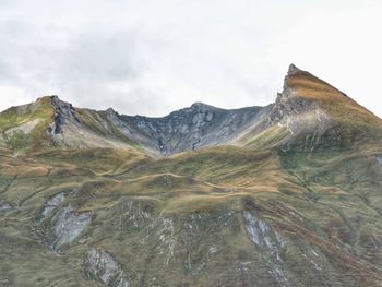 Scenic view of landscape and mountains against sky