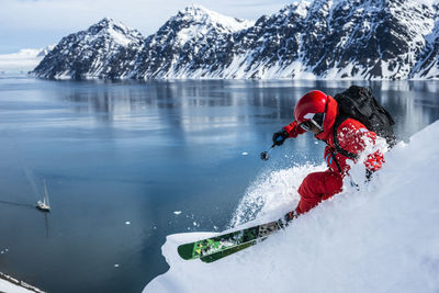 Man skiing backcountry in jan mayen