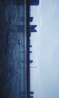 High angle view of sea against blue sky