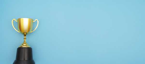 Electric lamp against blue background