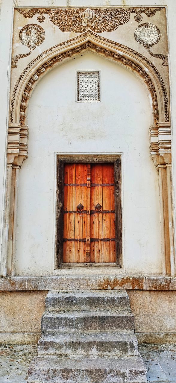 CLOSED DOOR OF OLD BUILDING