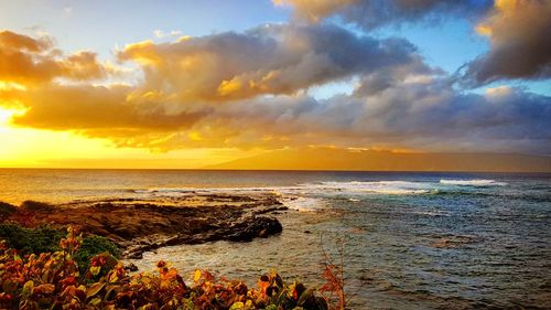 Scenic view of sea against sky during sunset